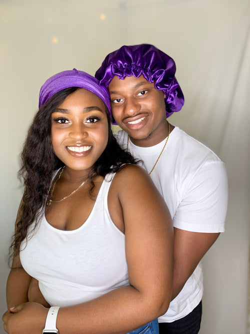Male and female wearing purple velvet bonnet and durag